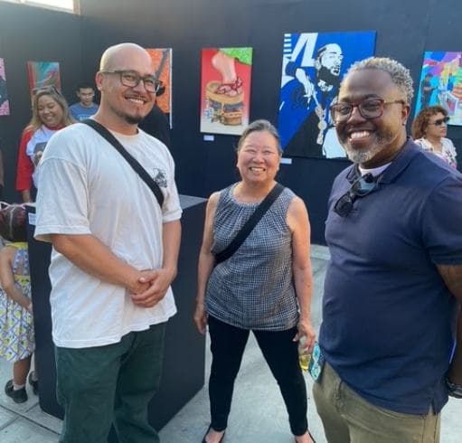 Local artists and visitors at an Inglewood art display